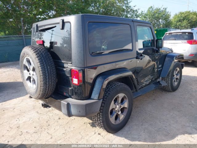 1C4GJWBG8GL220343 Jeep Wrangler Sahara