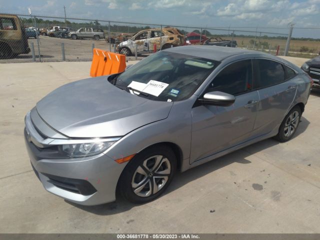2HGFC2F59JH580217 Honda Civic Sedan Lx