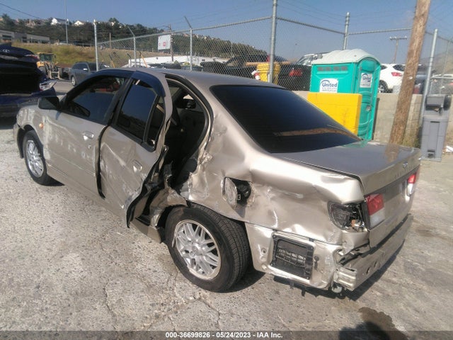 1999 INFINITI G20 VIN: JNKCP11A7XT009341