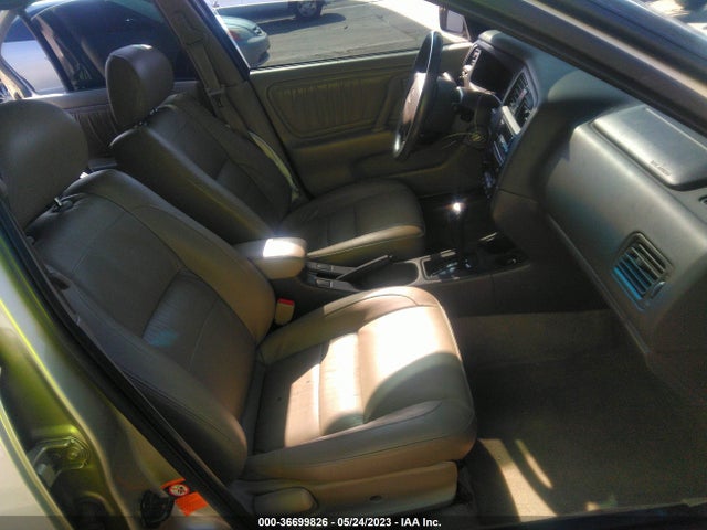 1999 INFINITI G20 VIN: JNKCP11A7XT009341