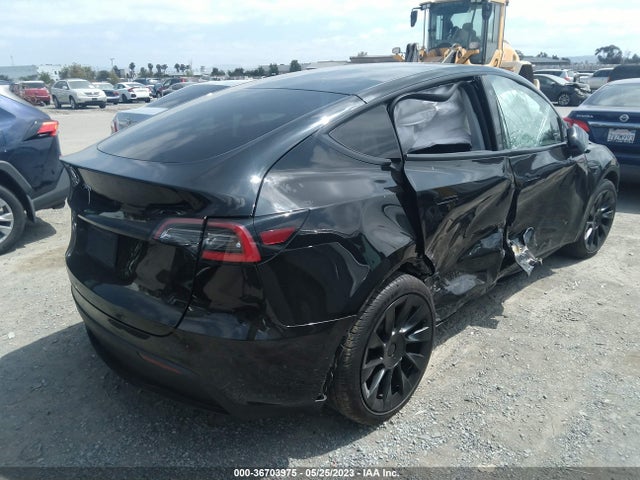 Tesla Model Y Standard Range 2021 5YJYGDED7MF112819 Image 4