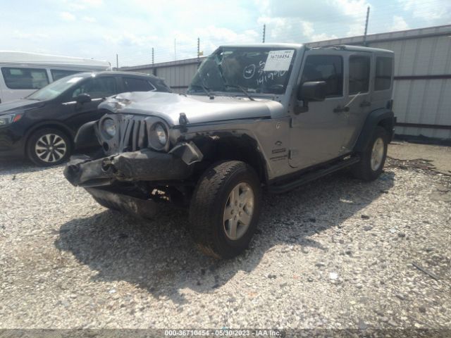1C4BJWDG8GL141990 Jeep Wrangler Unlimited Sport