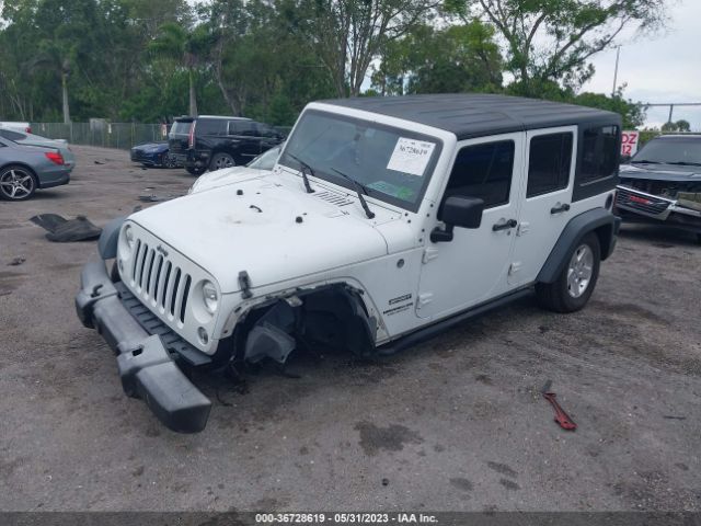 1C4BJWDG9GL129783 Jeep Wrangler Unlimited Sport