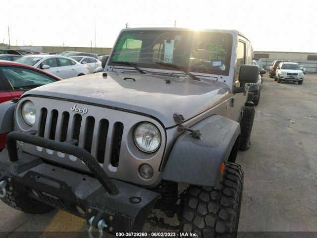 1C4BJWDG9GL186694 Jeep Wrangler Unlimited Sport
