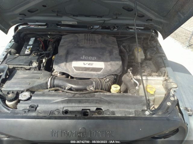 1C4BJWDG7EL260482 Jeep Wrangler Unlimited Sport