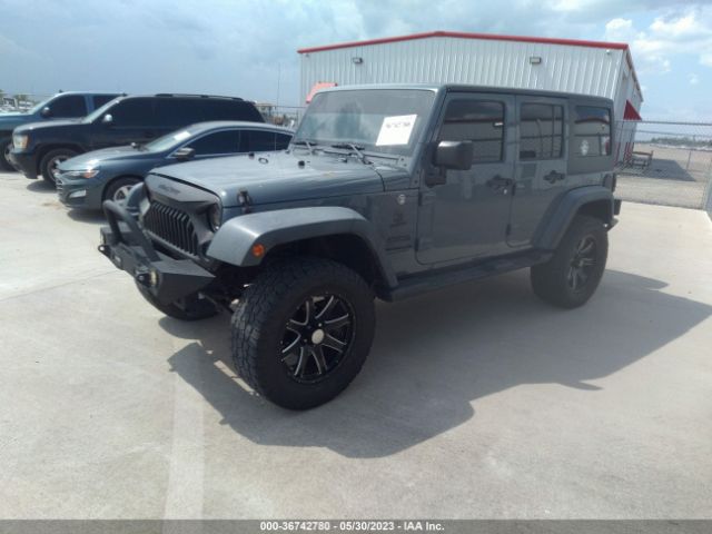 1C4BJWDG7EL260482 Jeep Wrangler Unlimited Sport