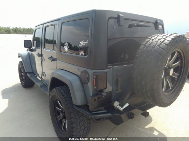 1C4BJWDG7EL260482 Jeep Wrangler Unlimited Sport
