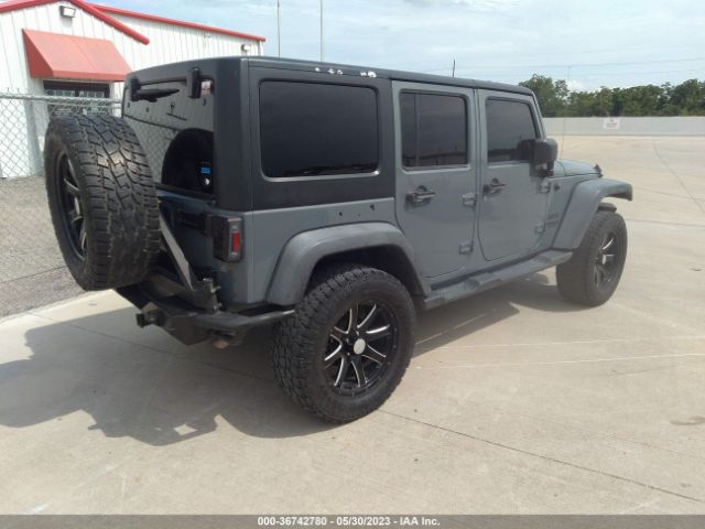 1C4BJWDG7EL260482 Jeep Wrangler Unlimited Sport