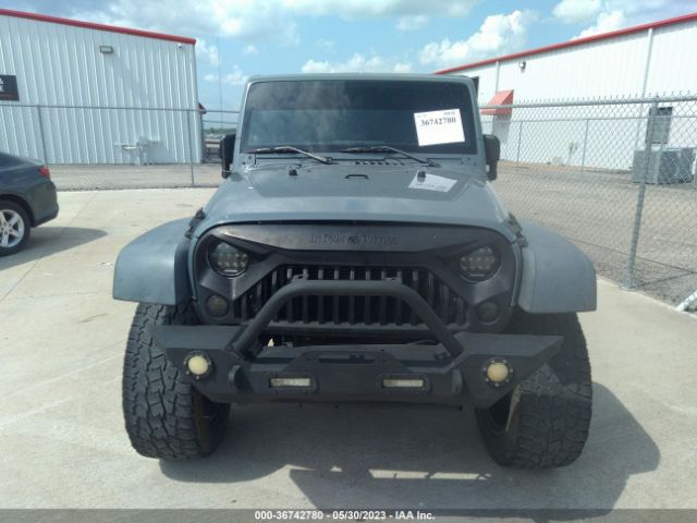 1C4BJWDG7EL260482 Jeep Wrangler Unlimited Sport