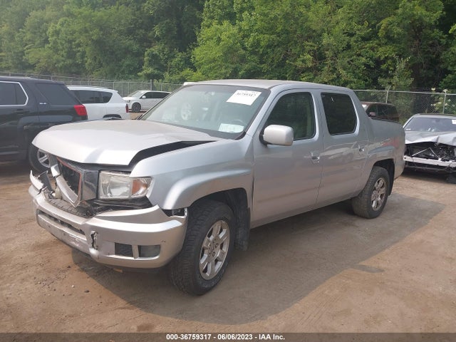 2011 HONDA RIDGELINE 5FPYK1F46BB454990 Photo 1