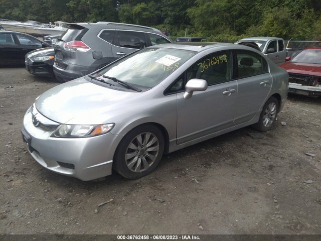 2010 HONDA CIVIC SDN EX-L VIN: 2HGFA1F93AH515138