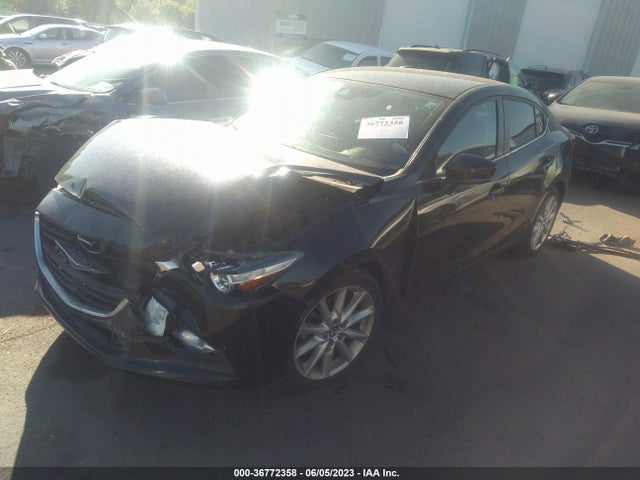 Mazda Mazda3 4-door Touring 2017 JM1BN1V78H1107597 Image 2