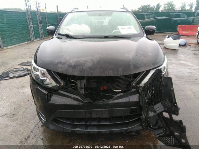 JN1BJ1CR0JW286813 Nissan Rogue Sport Sl