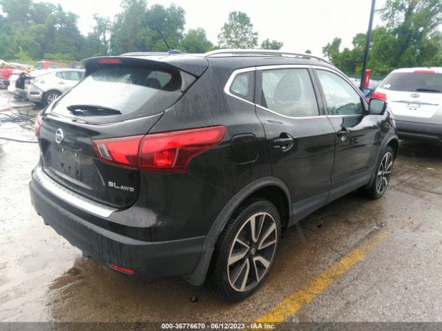 JN1BJ1CR0JW286813 Nissan Rogue Sport Sl