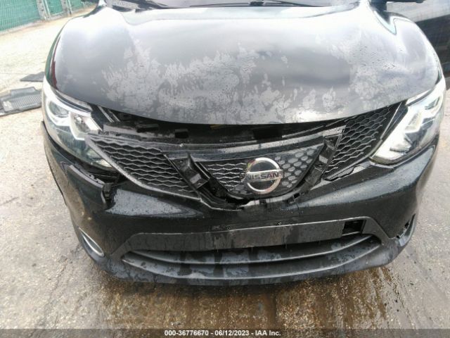JN1BJ1CR0JW286813 Nissan Rogue Sport Sl