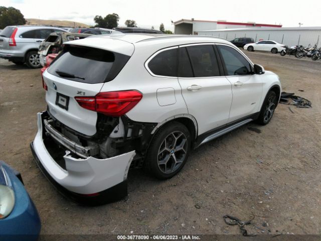 WBXHT3C34J5K21352 BMW X1 Xdrive28i