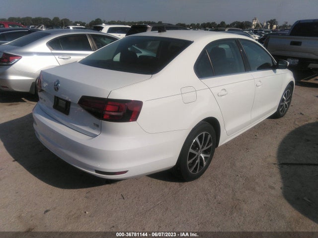 3VWDB7AJ0JM262205 Volkswagen Jetta 1.4t Se/1.4t Wolfsburg Edition