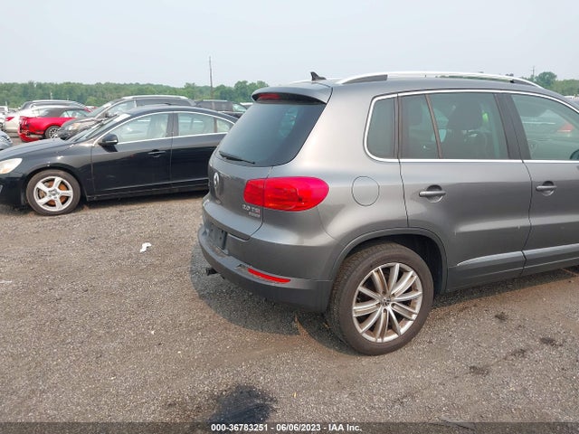 2012 VOLKSWAGEN TIGUAN SE W/SUNROOF & NAV VIN: WVGBV7AX9CW103574