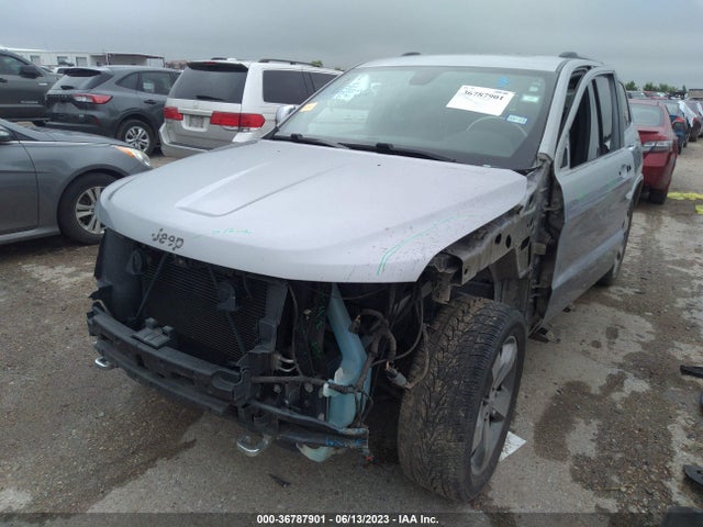 2014 JEEP GRAND CHEROKEE OVERLAND VIN: 1C4RJECG0EC291051