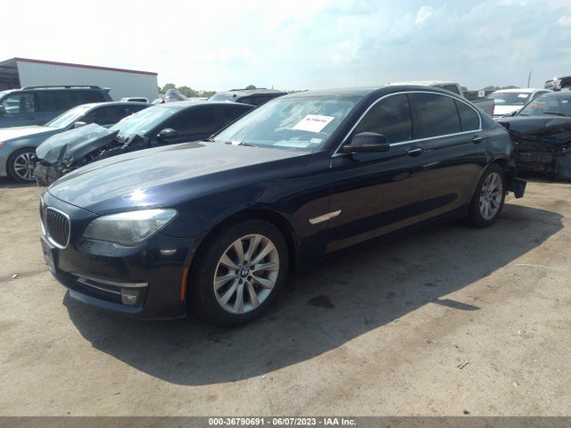 2013 BMW 7 SERIES 740I VIN: WBAYA6C59DD143910