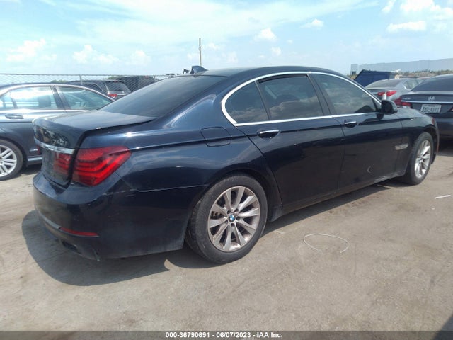 2013 BMW 7 SERIES 740I VIN: WBAYA6C59DD143910
