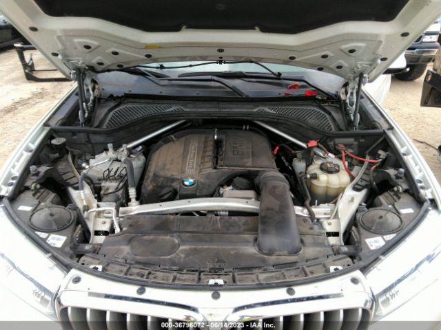 5UXKR2C54J0X07877 BMW X5 Sdrive35i
