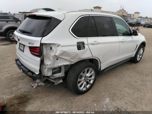 5UXKR2C54J0X07877 BMW X5 Sdrive35i