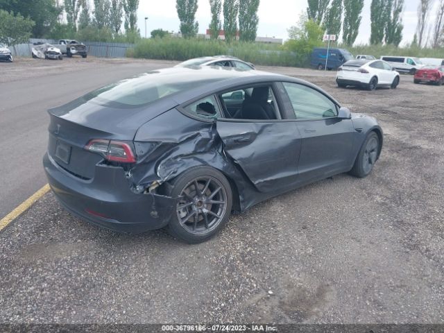 5YJ3E1EA2MF851004 Tesla Model 3 Standard Range Plus