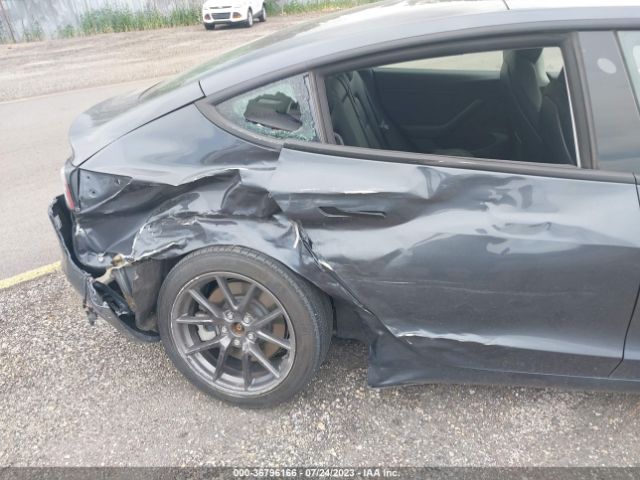 5YJ3E1EA2MF851004 Tesla Model 3 Standard Range Plus