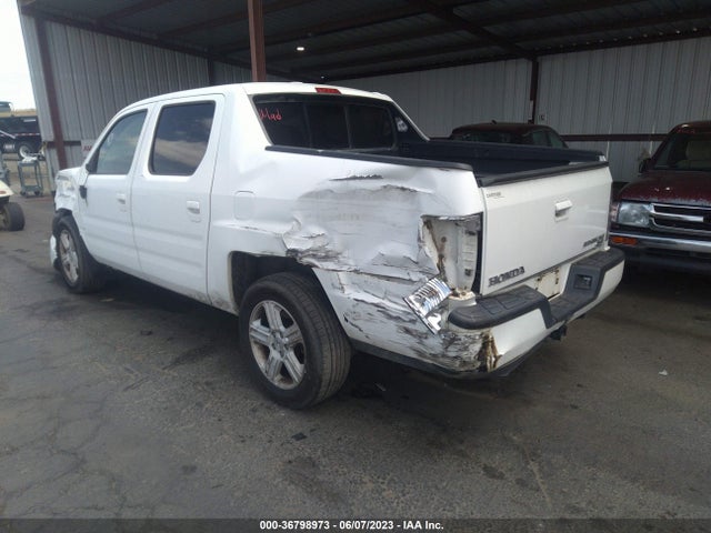 2014 HONDA RIDGELINE RTL VIN: 5FPYK1F59EB002044