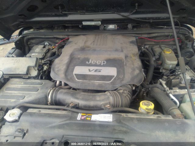 1C4AJWAG9EL100250 Jeep Wrangler Sport