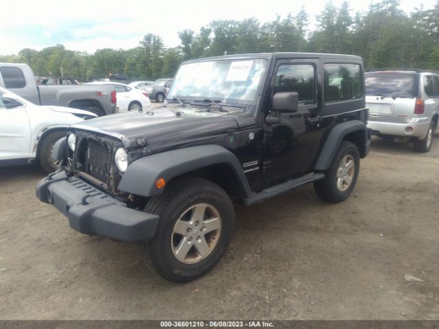 1C4AJWAG9EL100250 Jeep Wrangler Sport