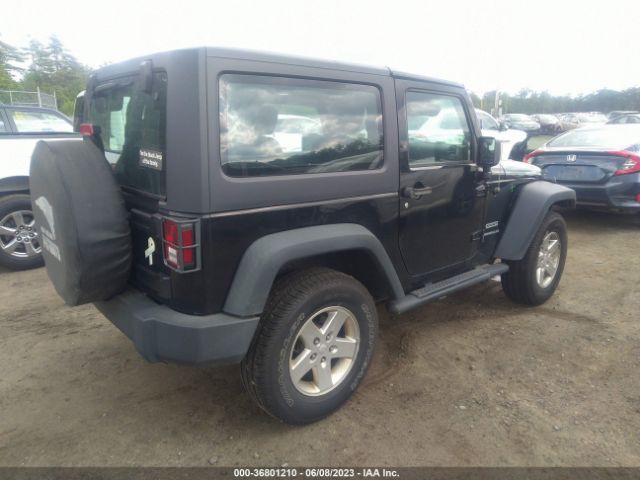 1C4AJWAG9EL100250 Jeep Wrangler Sport