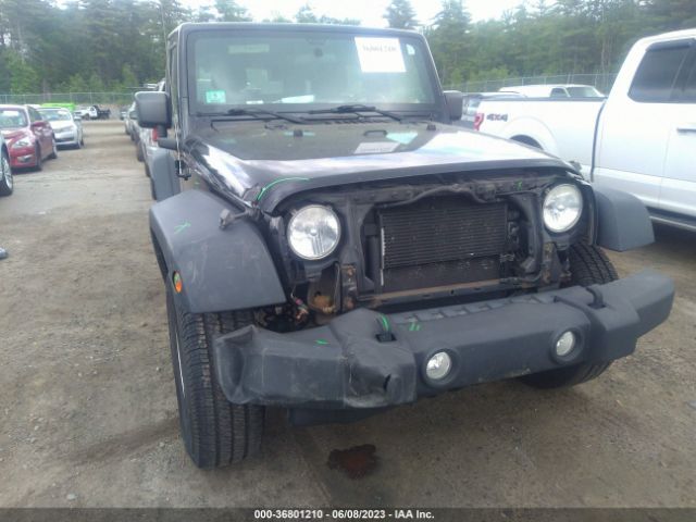 1C4AJWAG9EL100250 Jeep Wrangler Sport