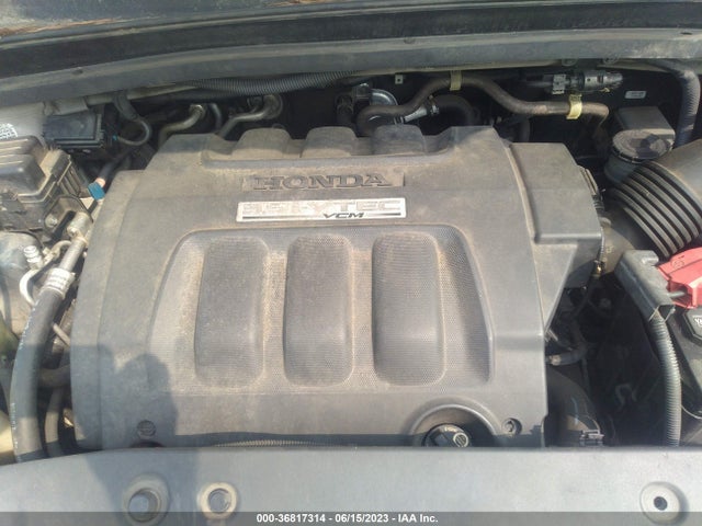 2007 HONDA ODYSSEY EX-L VIN: 5FNRL387X7B446668