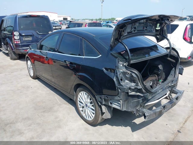 2014 FORD FOCUS TITANIUM VIN: 1FADP3J25EL263921