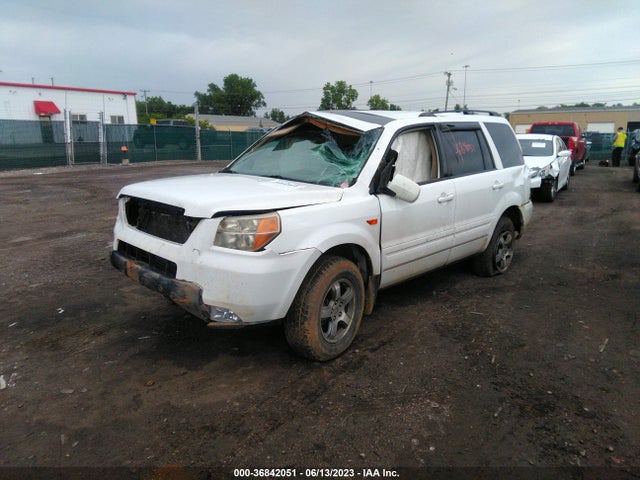 2007 HONDA PILOT EX-L VIN: 2HKYF18537H526580