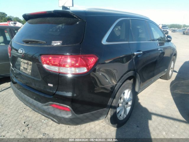 5XYPGDA35GG068129 KIA SORENTO LX