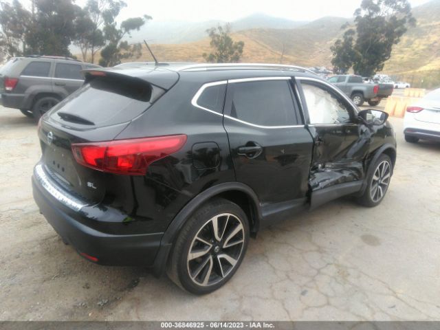 JN1BJ1CP5JW501164 Nissan Rogue Sport Sl