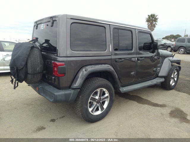 1C4HJXENXJW246114 Jeep Wrangler Unlimited Sahara