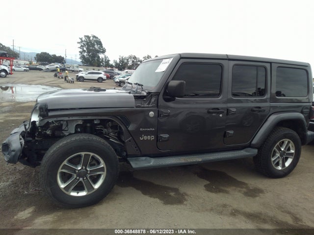 1C4HJXENXJW246114 Jeep Wrangler Unlimited Sahara