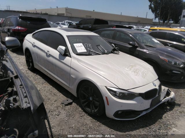 WBA4J5C59KBM65951 auction archive image