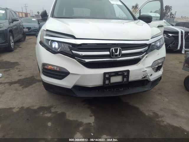 Honda PILOT LX 2018 5FNYF5H11JB029005 Image 6