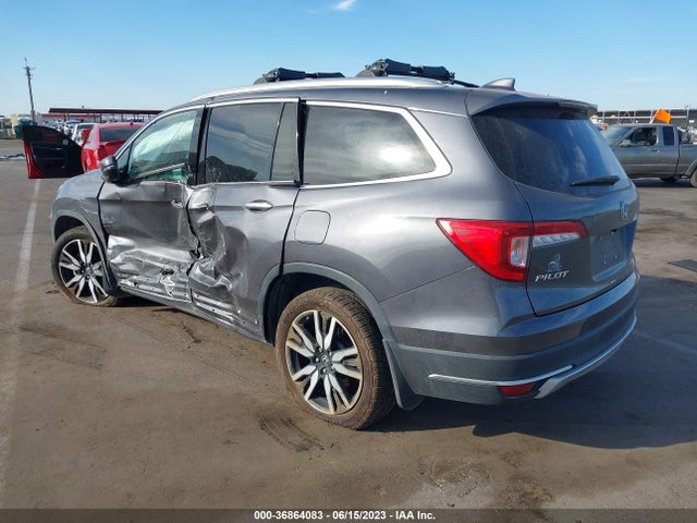Honda Pilot Touring 8-passenger 2019 5FNYF5H96KB010943 Image 3