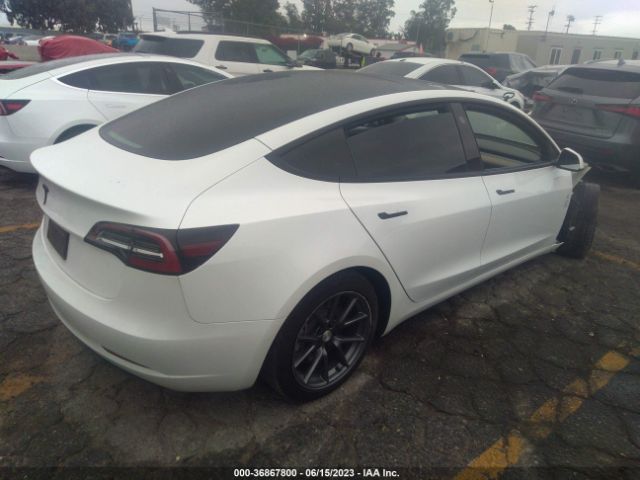5YJ3E1EA0MF077738 Tesla Model 3 Standard Range Plus