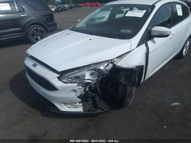 2015 FORD FOCUS SE VIN: 1FADP3K21FL295684