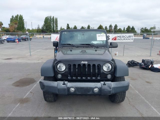 1C4AJWAG9GL111199 Jeep Wrangler Sport
