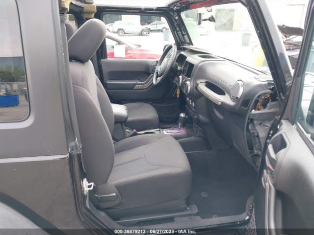 1C4AJWAG9GL111199 Jeep Wrangler Sport