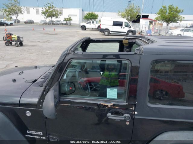 1C4AJWAG9GL111199 Jeep Wrangler Sport