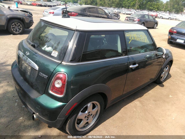 2010 MINI COOPER HARDTOP VIN: WMWMF3C57ATZ26627